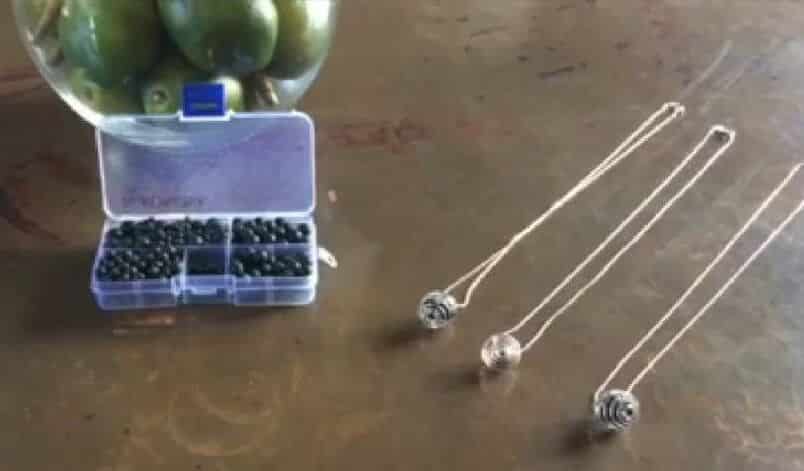 cage diffuser pendent with lava bead