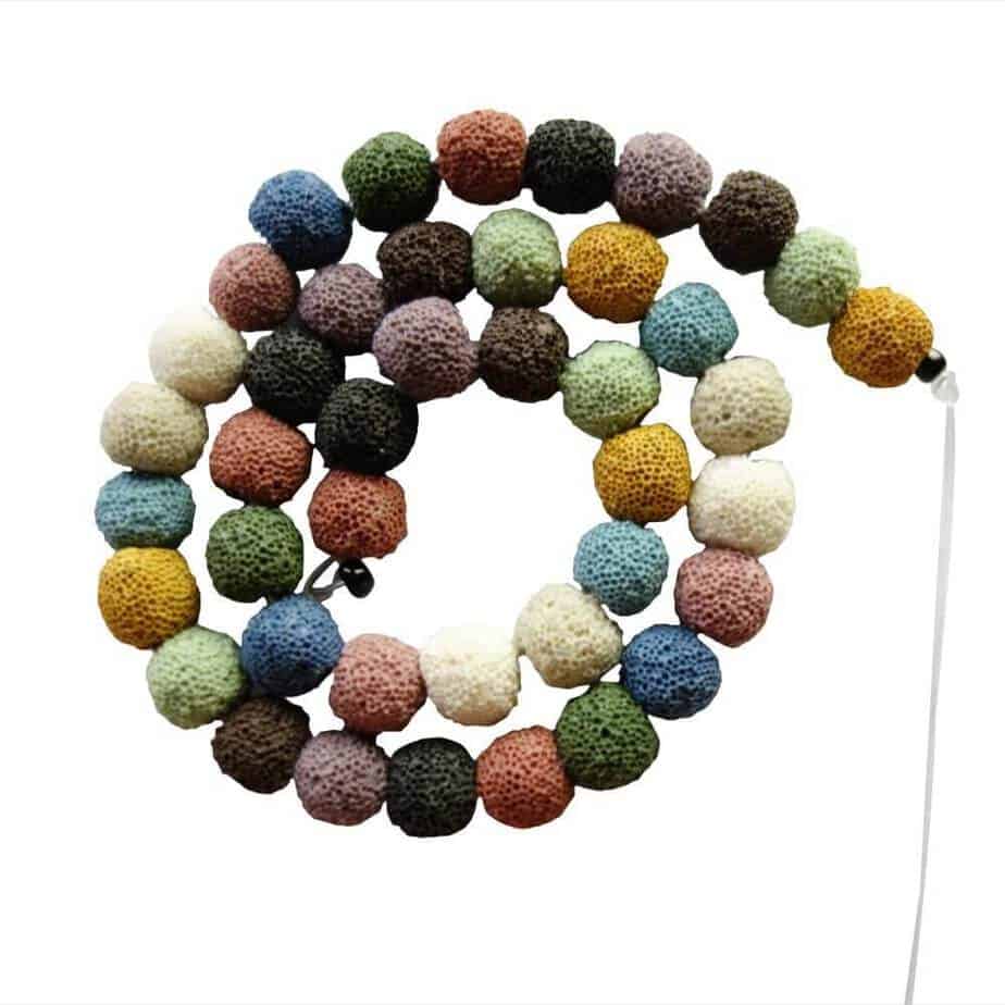 a string of colorful lava beads used to release the scent of essential oils in diffuser necklaces and bracelets