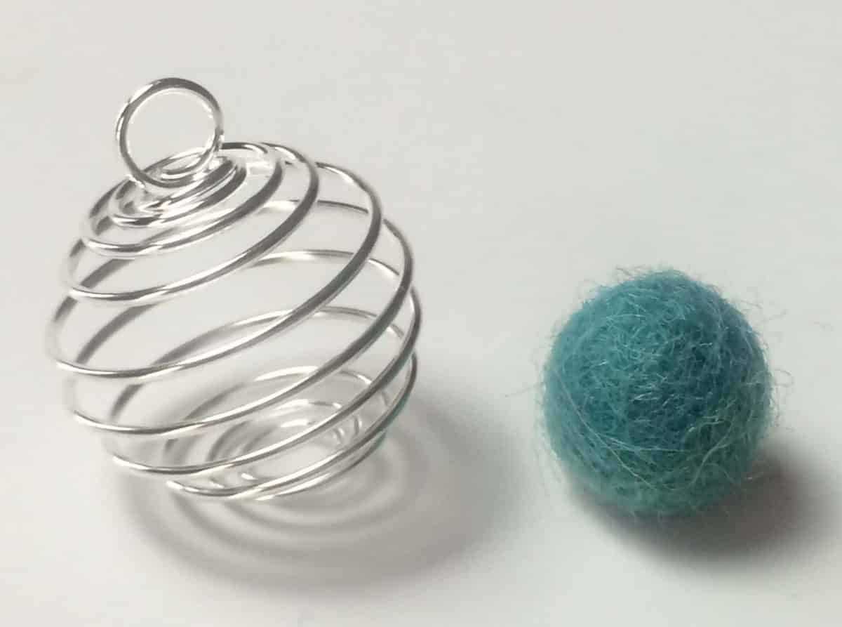 wire cage pendant and small cyan wool ball