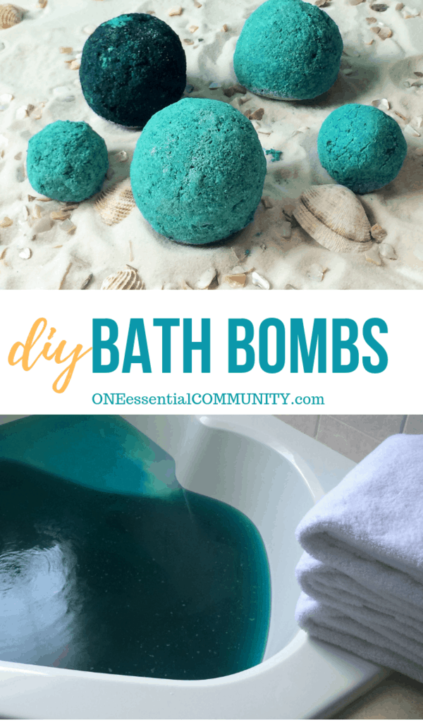 sea breeze bath bombs by ONEessentialCOMMUNITY.com with soaker tub filled with deep blue water from bath bomb beside fluffy white towels