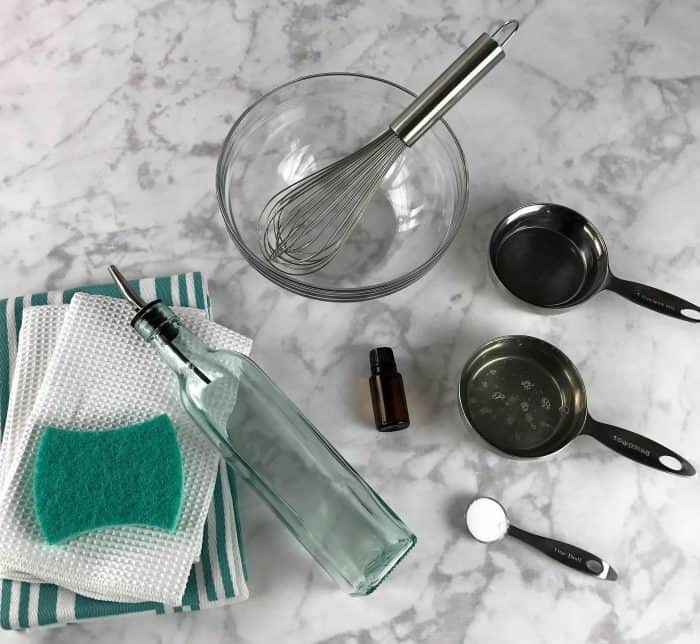 Homemade dish soap with the cleaning power of essential oils. Makes lots and lots of bubbles, cuts through grease, rinses well (even in hard water), gets dishes, silverware, and even glasses squeaky clean and sparkling. And it smells great!