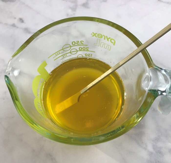 letting melted beeswax and coconut oil cool