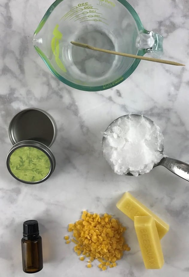 some of the supplies used to make homemade anti-itch cream- coconut oil, beeswax, essential oil 