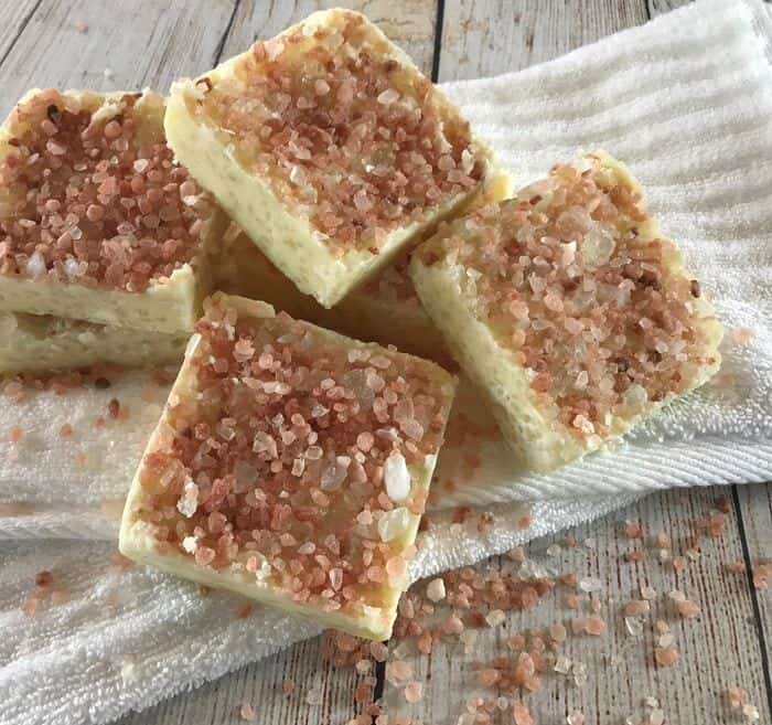 pile of salt scrub bars on top of wash cloth