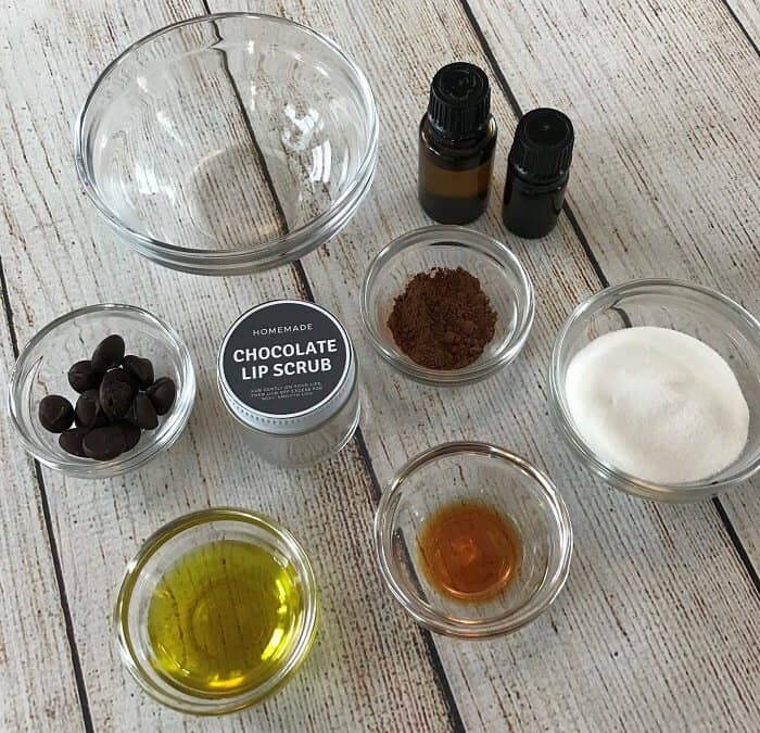 homemade chocolate lip scrub recipe with essential oils -- divine combination of chocolate & orange that's both hydrating and gently exfoliating, leaving you with soft, smooth, healthy lips. #essentialoils #essentialoilrecipes #lipscrub #sugarscrub #chocolatelipscrub #naturalDIY #naturalbeauty #lipscrubrecipes #essentialoilDIY #essentialoilGIFTS #DIYgifts #easyDIY