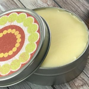 Upset stomach essential oil salve recipe for bloating, gas, constipation, indigestion, nausea, diarrhea, cramps, or motion sickness). This natural home remedy works both topically and aromatically to help calm and soothe tummy troubles. #essentialoils #essentialoilrecipe #naturalremedy #upsetstomach #homemade #DIYessentialoil