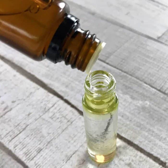 natural anti-aging serum with essential oils -- boosts collagen, rejuvenates cells, and plumps skin to reduce appearance of fine lines and wrinkles {essential oil recipes, essential oil uses, natural beauty, DIY recipes, essential oils for wrinkles, essential oils for aging, essential oils for skincare}
