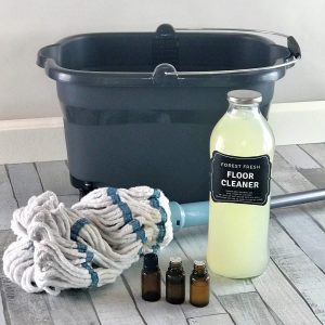 homemade floor cleaner for all your floors - hardwood, laminate, tile, linoleum, and vinyl. 3 ingredient recipe for spotless, streak-free, sparkly, shiny floors. No vinegar, no rinse, non-toxic. {essential oil cleaner, DIY cleaner, essential oil recipes, hardwood floor cleaner, essential oil floor cleaner, tile floor cleaner, laminate floor cleaner)