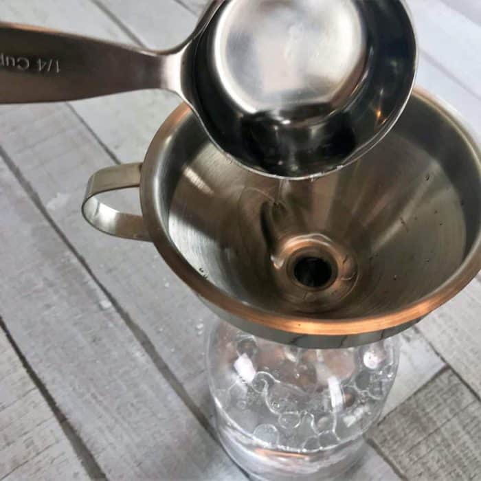 DIY dusting spray with essential oils- cleans and repels dust so you clean less often. Plus it moisturizes, nourishes, and protect wood. It's like a combined dusting spray and wood polish. {free printable label, essential oil recipe, essential oil cleaning, homemade dusting spray, essential oil spray}, natural cleaning} #essentialoilrecipes #DIYessentialoil #naturalcleaning