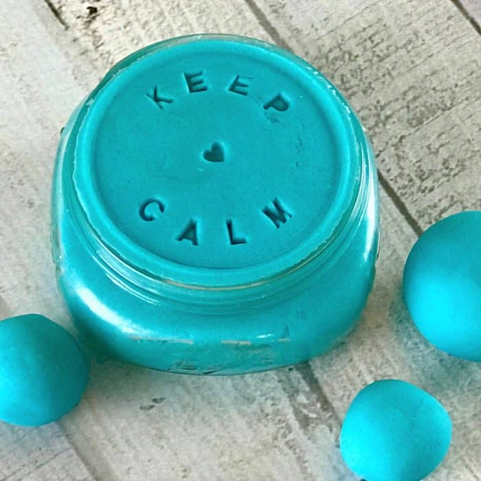 This is the absolute best homemade aromatherapy playdough to help ease stress and anxiety. Easy to customize and make your perfect scent with info about 20+ calming essential oils and 15+ soothing aromatherapy recipes. Super easy to make, uses common ingredients you probably have in your kitchen, in vibrant colors that won't stain your skin, and stays soft & pliable for months. essential oil recipe, DIY playdough, calming playdough, DIY essential oil, doTERRA, Young Living