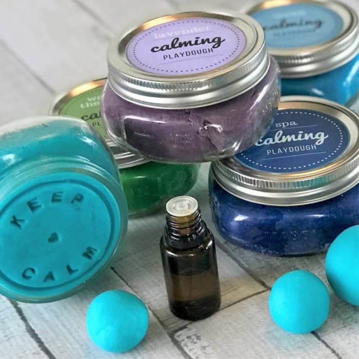 This is the absolute best homemade aromatherapy playdough to help ease stress and anxiety. Easy to customize and make your perfect scent with info about 20+ calming essential oils and 15+ soothing aromatherapy recipes. Super easy to make, uses common ingredients you probably have in your kitchen, in vibrant colors that won't stain your skin, and stays soft & pliable for months. essential oil recipe, DIY playdough, calming playdough, DIY essential oil, doTERRA, Young Living