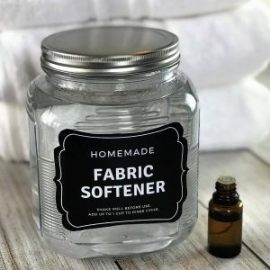 homemade fabric softener recipe made with essential oils- free printable label- This easy 2-ingredient natural, non-toxic homemade fabric softener is better than store-bought versions. It's cheap, easy to make, gets clothes cleaner than detergent alone, makes towels soft, fluffy & absorbent, helps prevent static cling and smells great! #essentialoils #doterra #yl #youngliving #diy #natural #printable #freeprintable -- essential oil recipe, natural cleaning