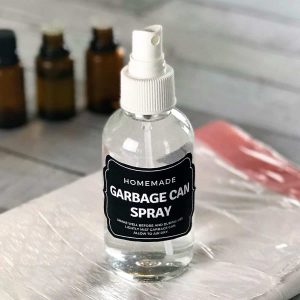 DIY trash can deodorizer spray made with essential oils- gets rid of stinky smells and keeps garbage cans smelling fresh & clean for days. {essential oil recipe, essential oil cleaning, essential oil spray, doterra, young living, plant therapy, natural cleaning} #doterra #youngliving #essentialoilrecipes