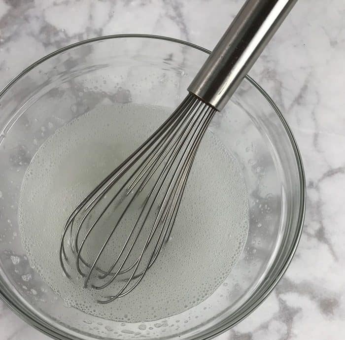 whisking together the homemade dish soap