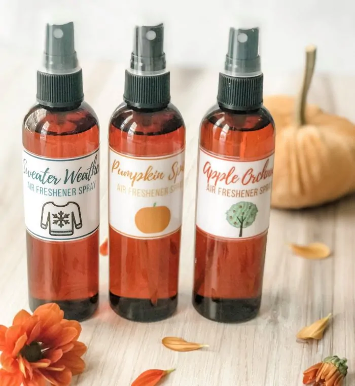 3 DIY Fall air freshener spray bottles with velvet pumpkin and flowers