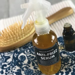 diy Anti-Frizz Serum {made with essential oils} - locks in moisture, nourishes, smooths hair, and controls frizz. Works great for dry hair, curly hair, and humid weather. (essential oil recipe, natural beauty, essential oils for hair, #DIY, #hair, #doTERRA, doTERRA, Plant Therapy, Young Living)