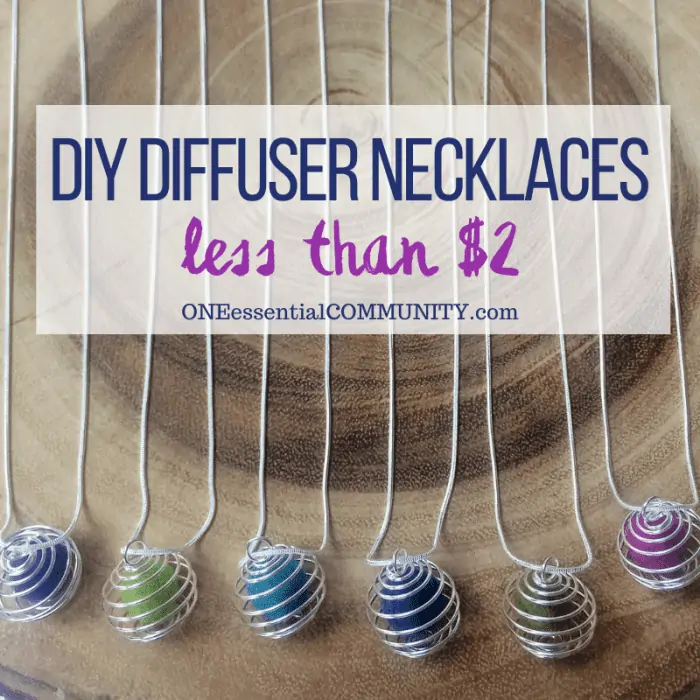 DIY diffuser necklaces for less than $2 by oneessentialcommunity.com -- 6 diffuser necklaces on wooden board