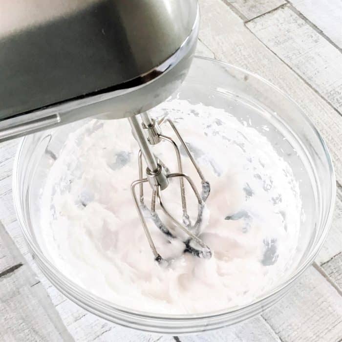 coconut oil being whipped with hand mixer