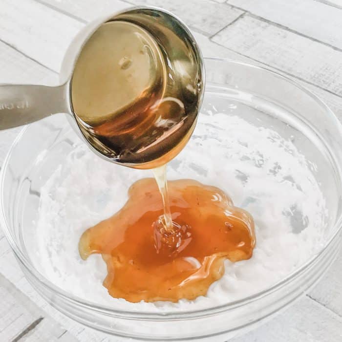 honey being added to coconut oil