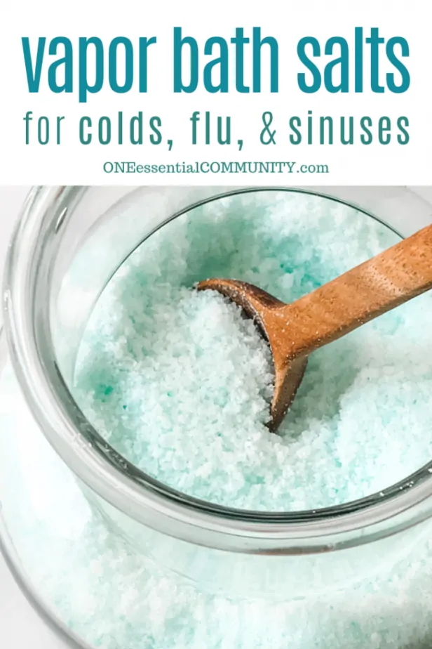 wooden scoop with green bath salts for colds and flu