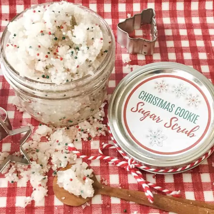 Christmas Cookie Sugar Scrub in jar, next to lid with custom label