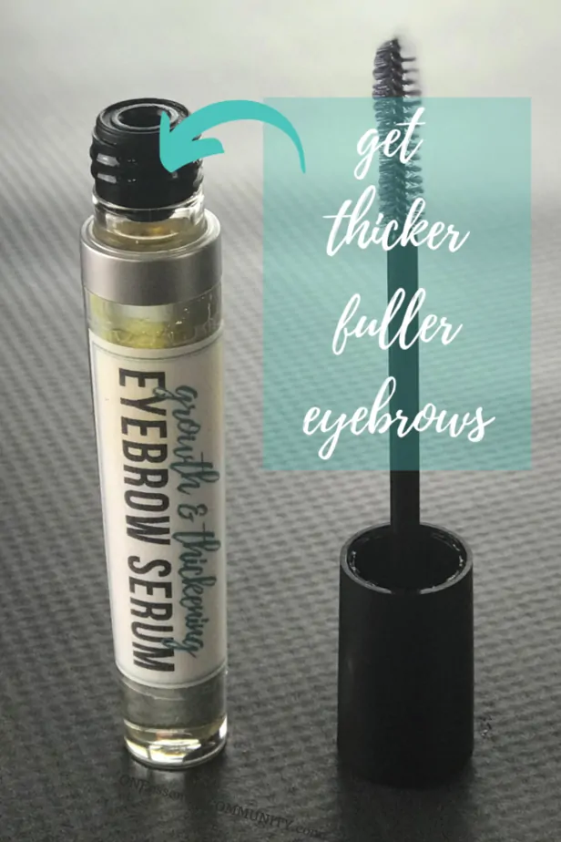 DIY eyebrow serum for thicker, fuller, faster growing eyebrows - tube stands next to applicator wand