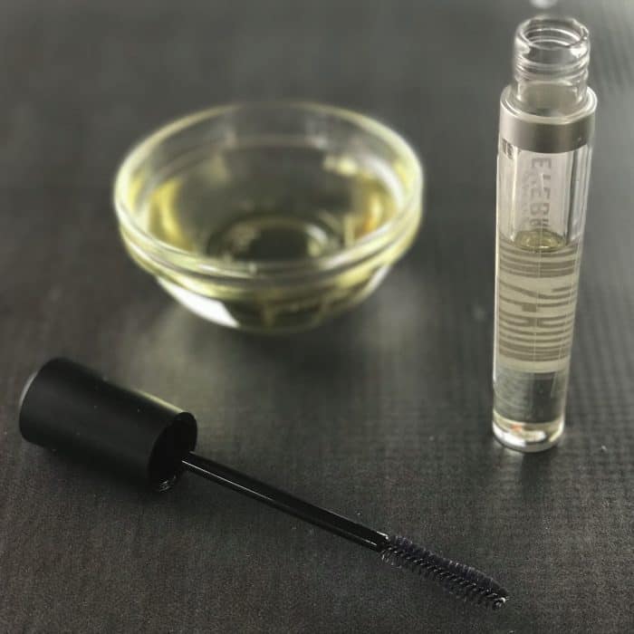 fill eyegrowth serum bottle half full with castor oil