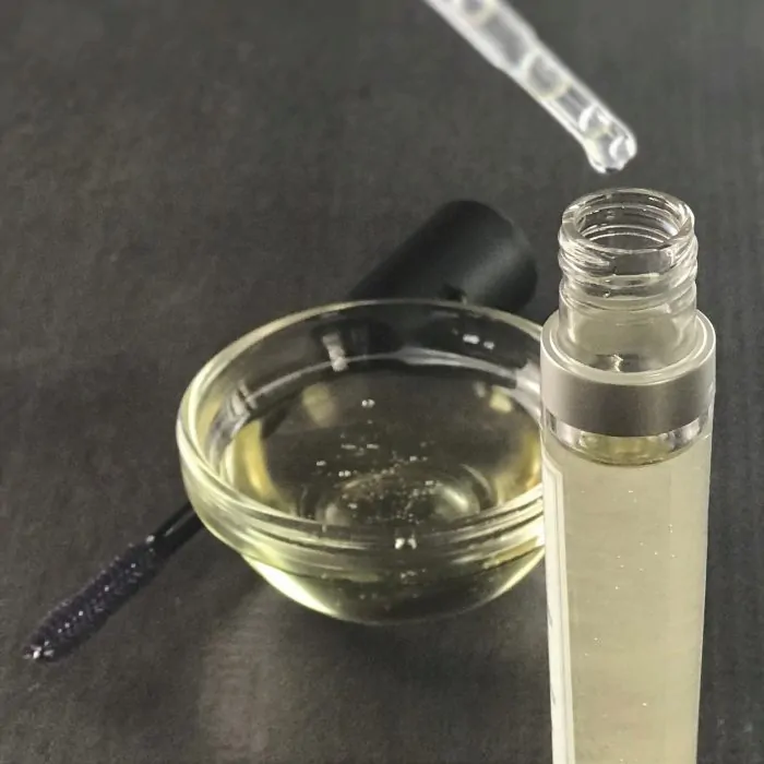 adding vitamin E oil to eyebrow serum with castor oil and almond oil