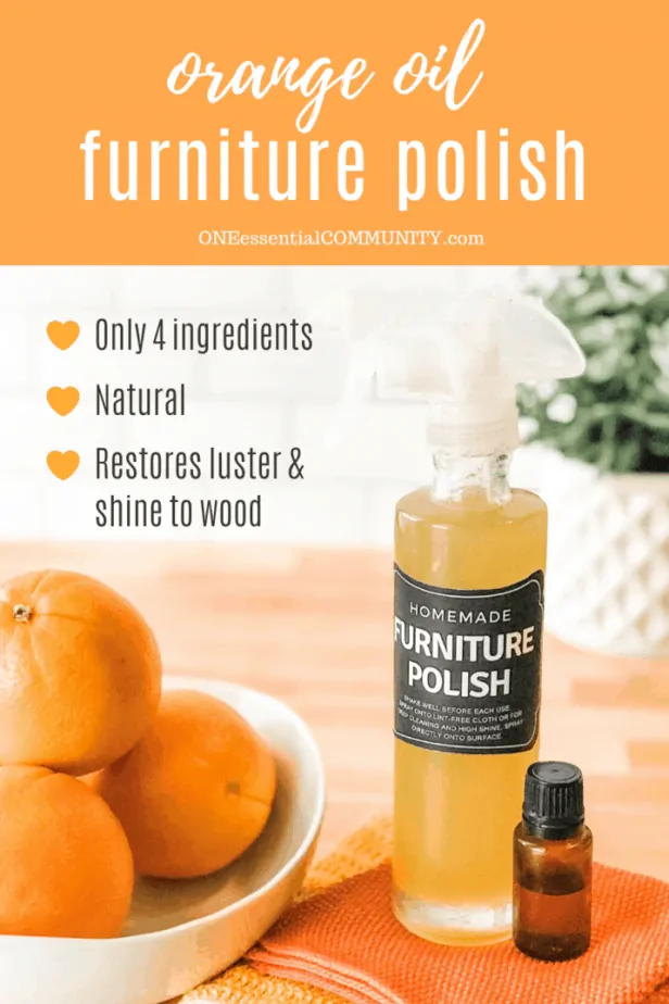 Homemade DIY orange oil furniture polish in custom bottle, sweet orange essential oil bottle, bowl of oranges