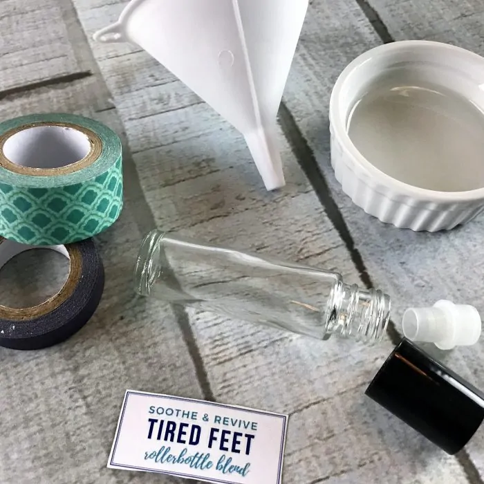supplies for tired feet essential oil roller (10ml roller bottle, free printable label, small funnel, mini bowl with fractionated coconut oil)