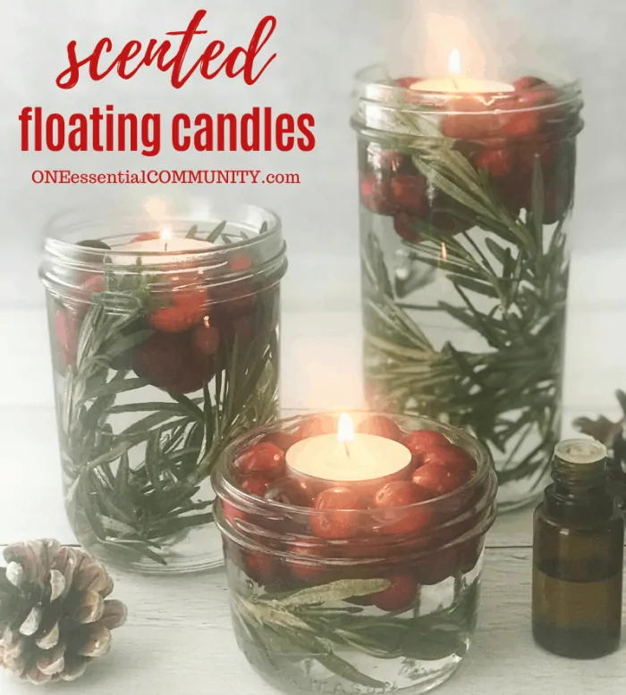 scented floating candles with essential oils title image with lit scented floating candles christmas berries greenery