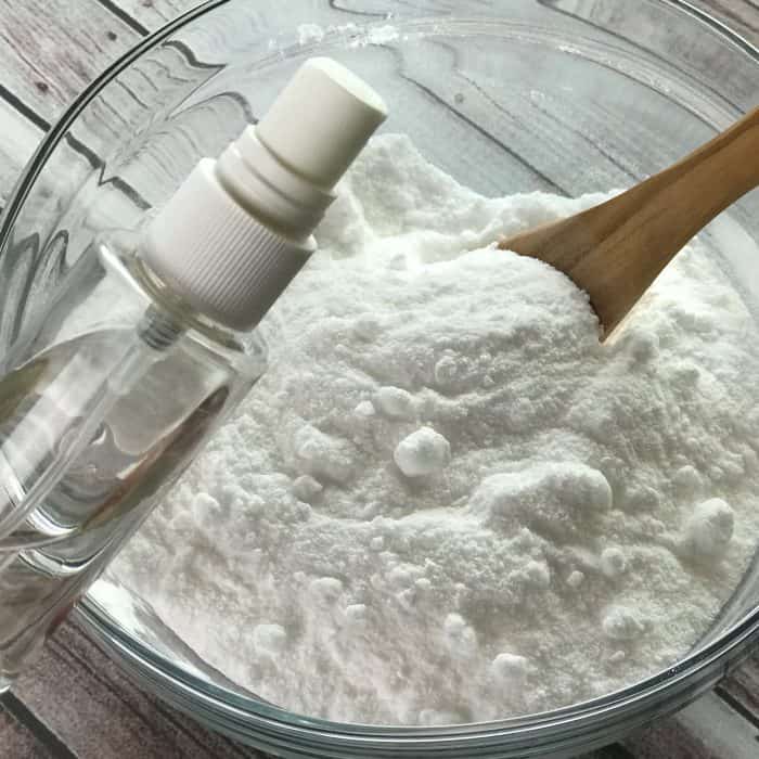 adding witch hazel from clear spray bottle to essential oil facial steamer tab mix of ingredients baking soda citric acid tea tree essential oil