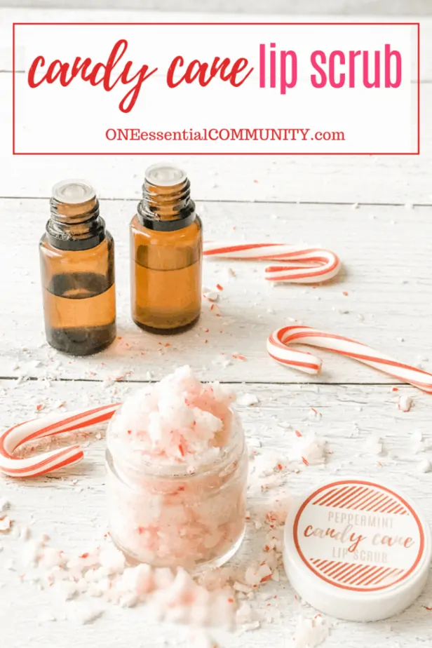 peppermint candy cane lip scrub with essential oils overflowing in glas jar, candy cane, essential oils bottles
