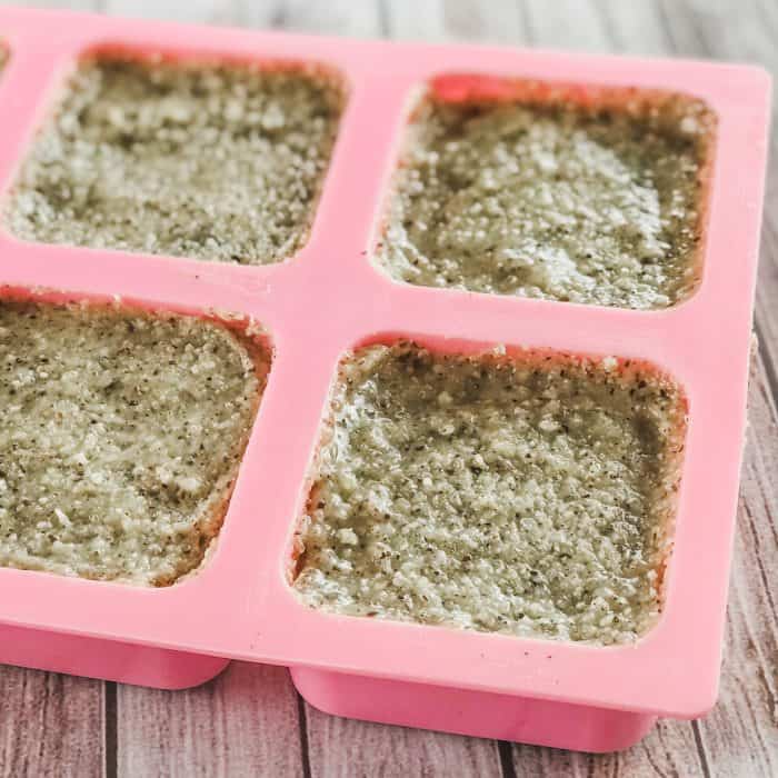 DIY Lush Buffy Bar with essential oils mixture in silicone molds for cooling and formation into homemade Lush Buffy Bars