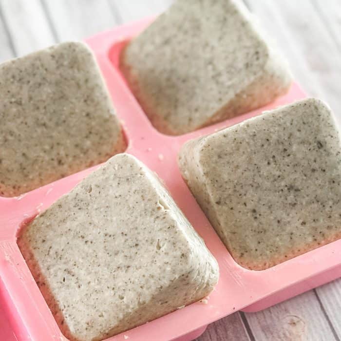 solidified homemade Lush Buffy Bars with essential oils popping out of silicone molds