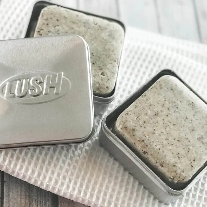placing homemade Lush Buffy Bars with essential oils into Lush tins for storage