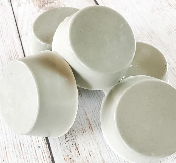 DIY clay facial soap made with essential oils deep cleans minimizes pores and fights acne