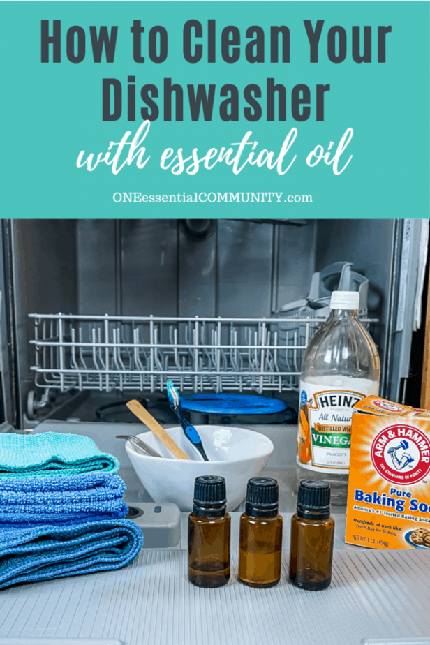 how to clean your dishwasher with essential oil (open dishwasher with supplies on dishwasher door)