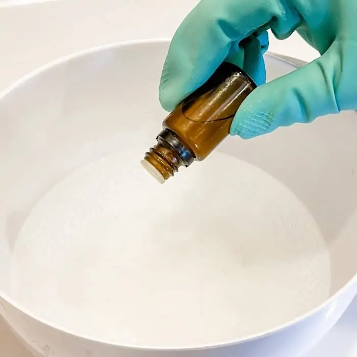 adding essential oil to washing machine cleaner