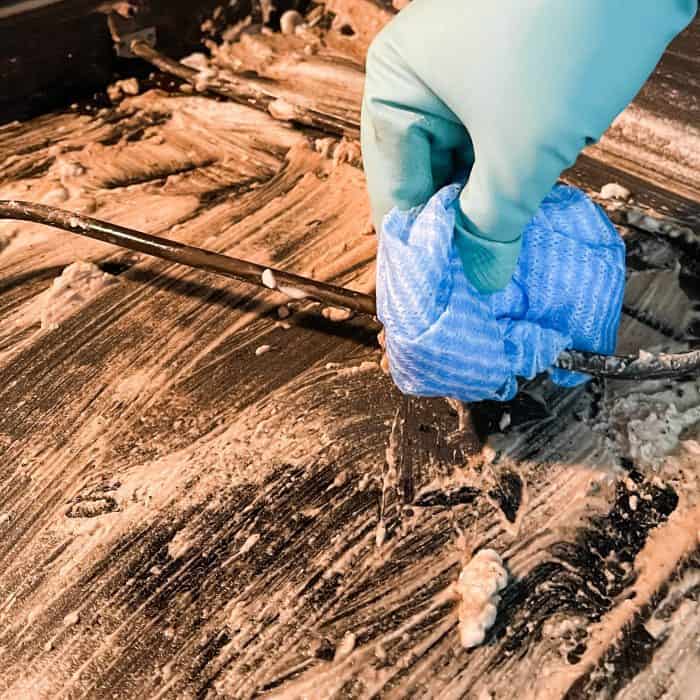 use clean cloth to wipe up any cleaning paste that gets on heating element