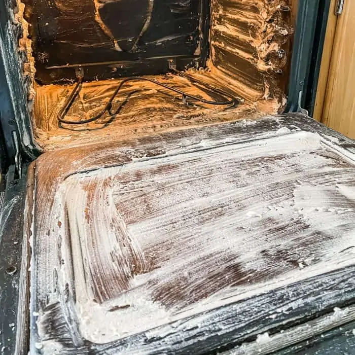 natural oven cleaner applied to oven walls, bottom, and door --allow it to work for 1 hour