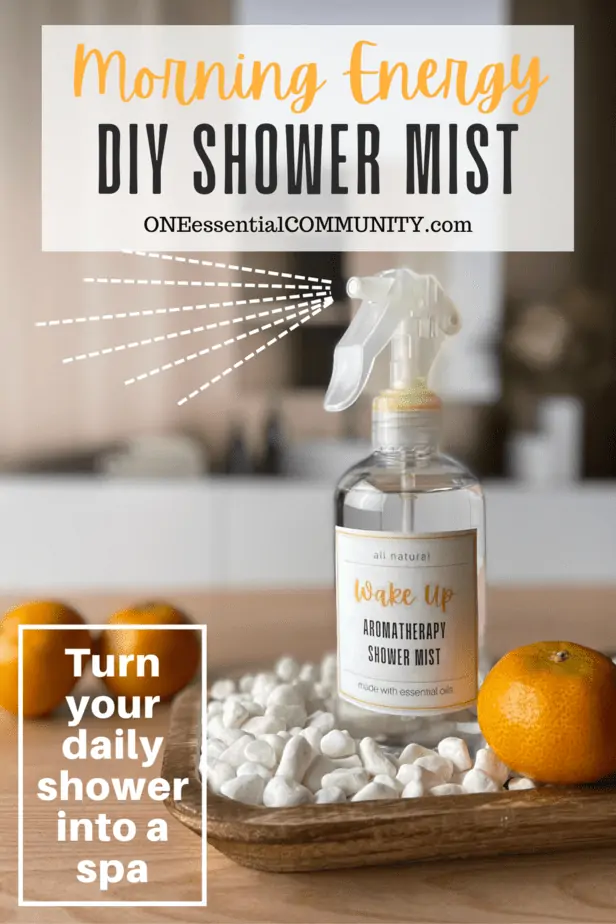 Morning Energy DIY Shower Mist by oneessentialcommunity.com -- turn your shower into a spa -- shows shower mist bottle on wooden tray next to 3 clementines on spa countertop