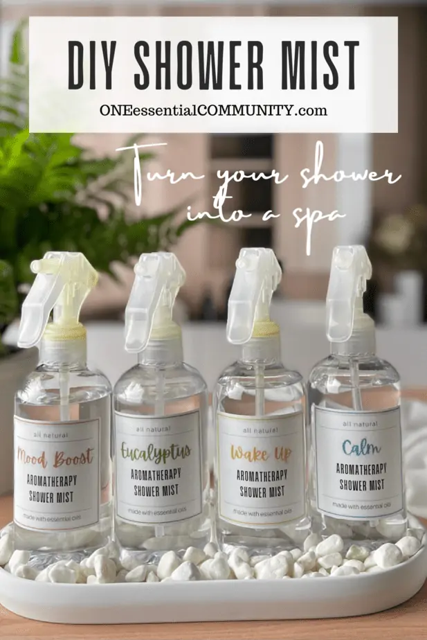 DIY Shower Mist by oneessentialcommunity.com -- turn your shower into a spa -- shows 4 spray bottles in a tray on spa counter