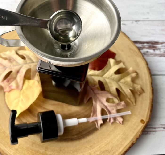 adding 1 teaspoon sweet almond oil to foaming soap dispenser