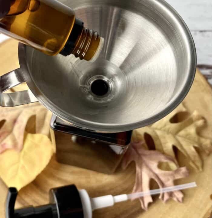 adding essential oil to foaming soap mixture