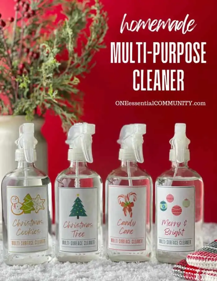 homemade multi-purpose cleaner by oneessentialcommunity.com -- 4 glass spray bottles with printable labels for Christmas Cookie, Christmas Tree, Candy Cane, and Merry & Bright all-purpose cleaner scents